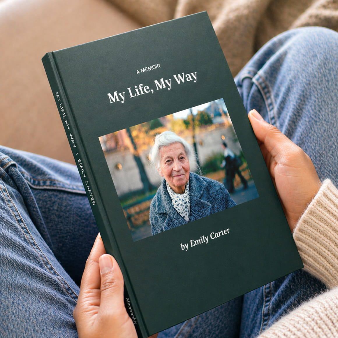 Green 'My Life, My Way' memoir by Emily Carter held in someone's lap